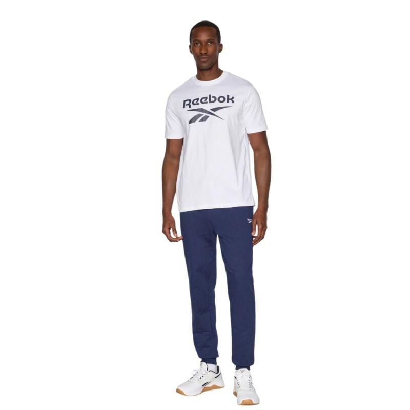 Reebok Andre navy fleece jogger trousers with cuffed ankles and drawstring waist
