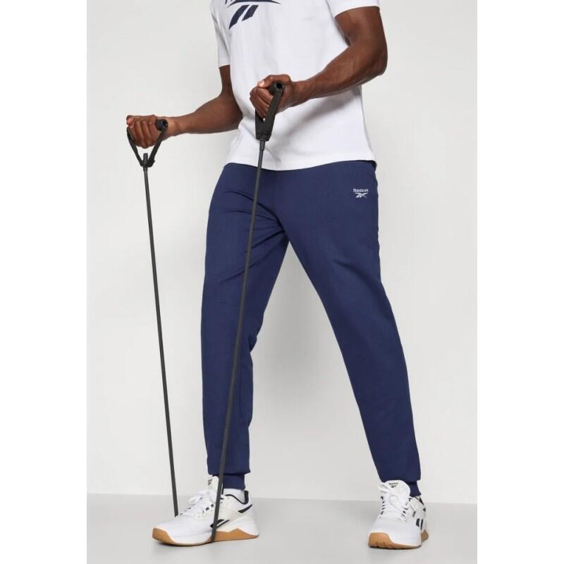Pantalone lungo Reebok Andre navy in fleece, con polsini e coulisse 4/4