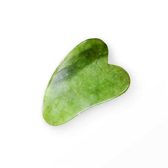 Pierre Gua Sha - massage visage - drainage visage - tension mâchoire