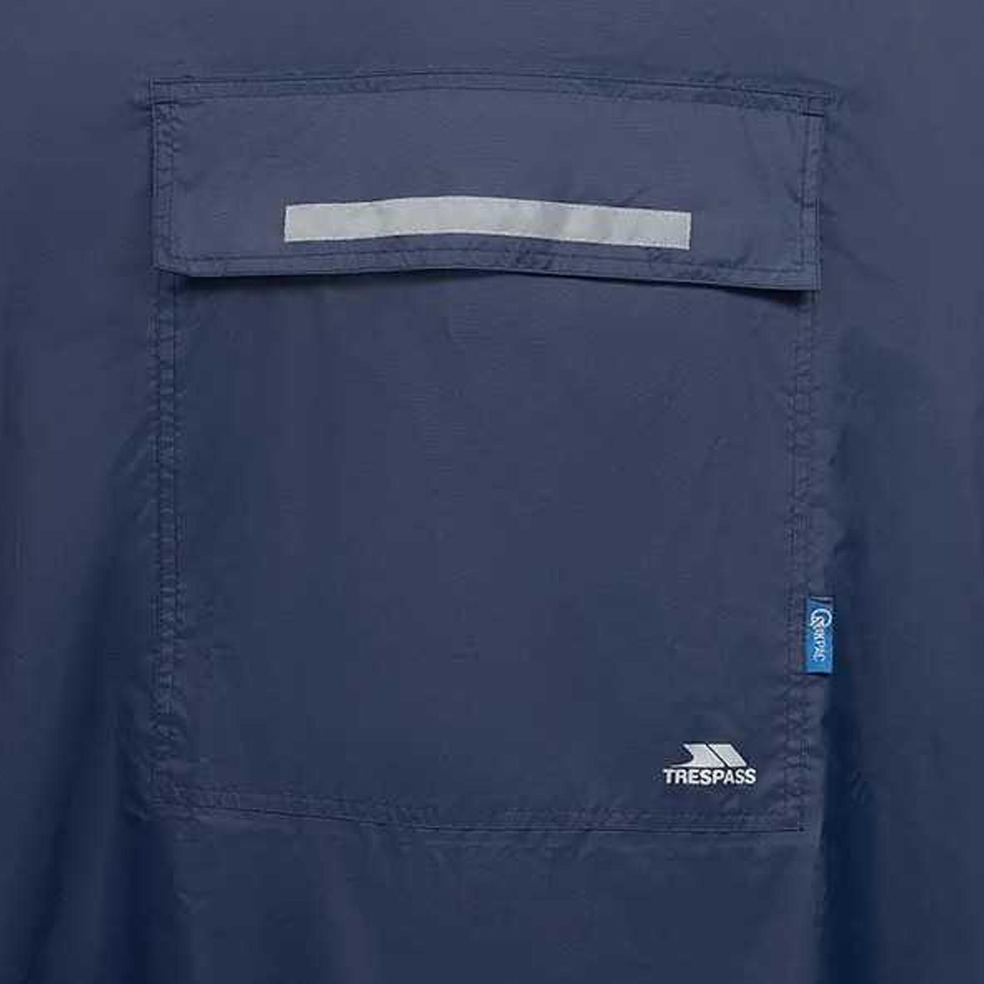 Chubasquero / Poncho impermeable con capucha transportable Modelo Qikpac 3/5