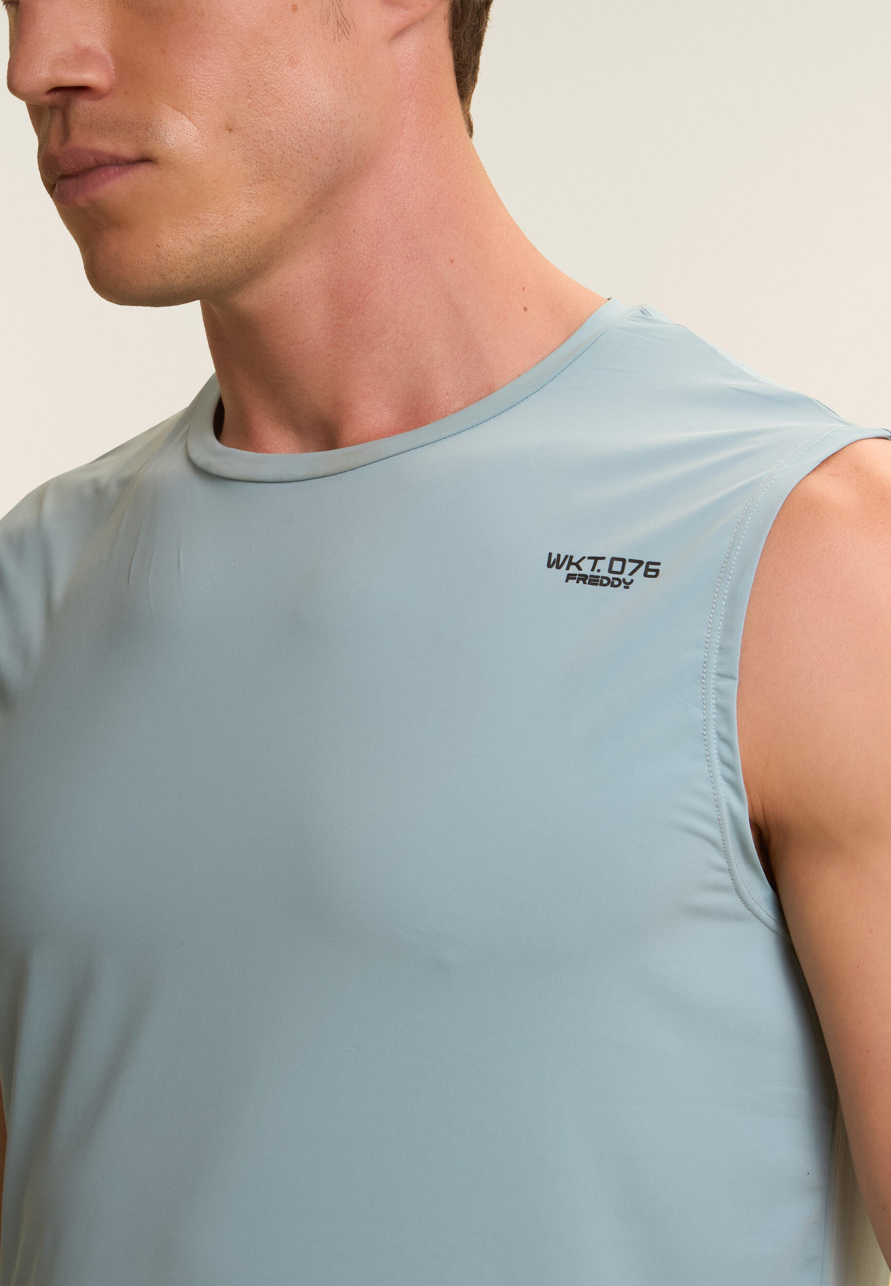 Camiseta sin mangas en tejido de secado rápido 4/4