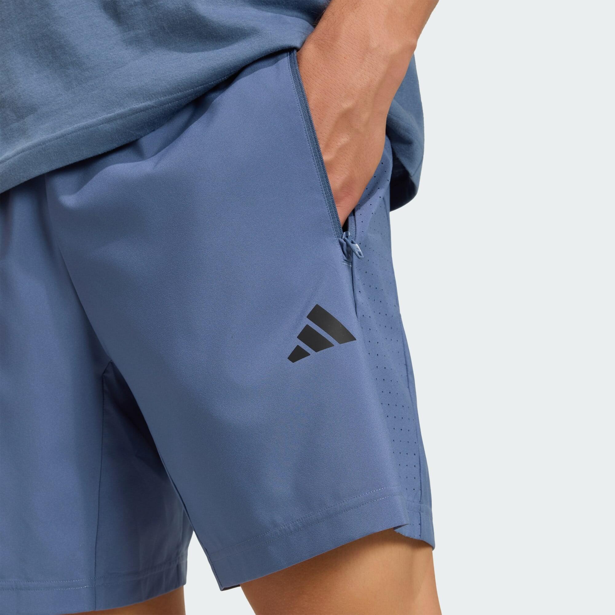 SHORT DA ALLENAMENTO ESSENTIALS BASE WOVEN 4/5