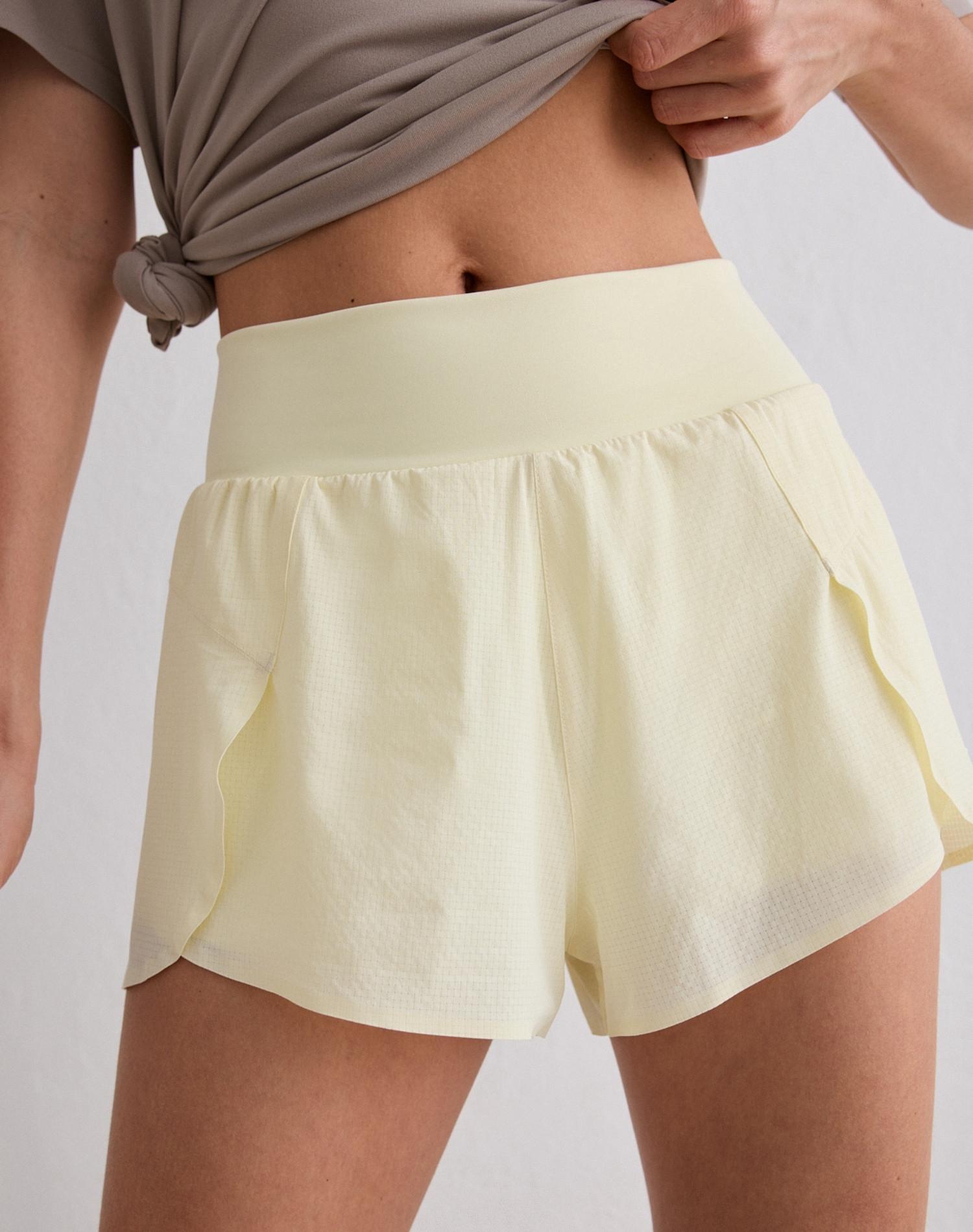 Shorts da Corsa da Donna 2‑in‑1 Traspiranti ad Asciugatura Rapida Bianco Limone 2/7