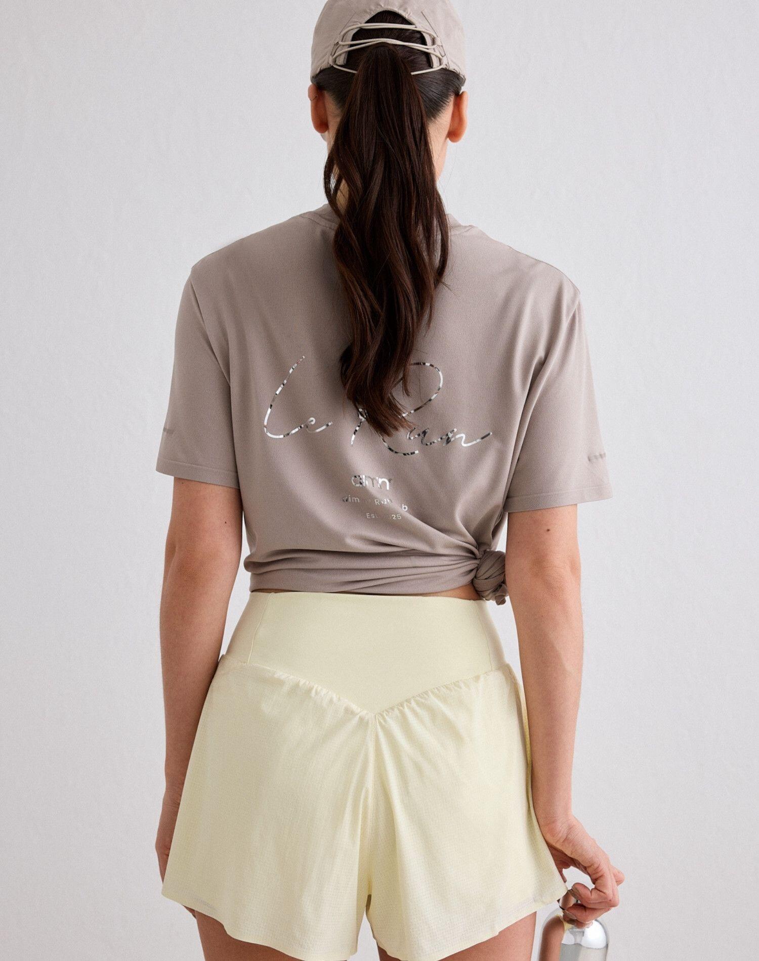 Shorts da Corsa da Donna 2‑in‑1 Traspiranti ad Asciugatura Rapida Bianco Limone 6/7