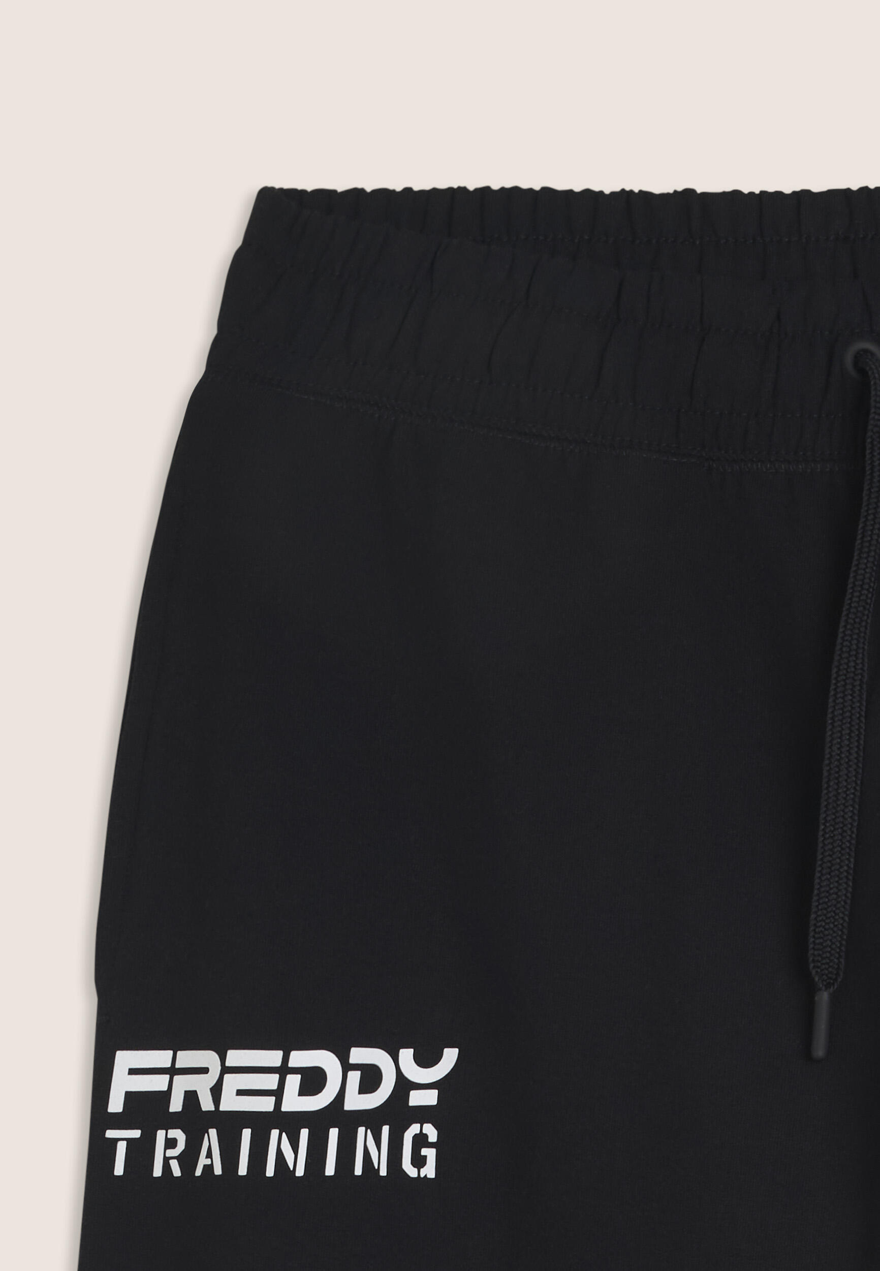 Pantalón de corte clásico y bolsillo con cremallera en la pernera 3/3
