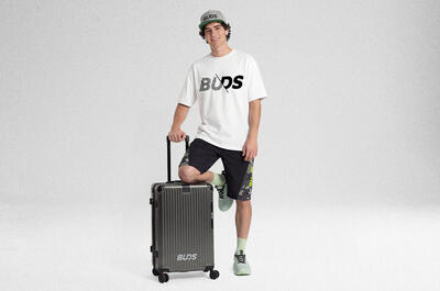 Valigia rigida da viaggio con rotelle - media