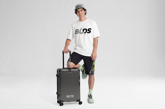 Valigia rigida da viaggio con rotelle - media