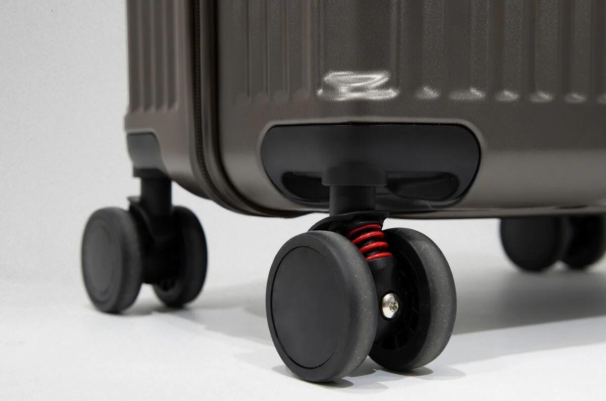 Valise rigide de voyage à roulettes - medium 6/7