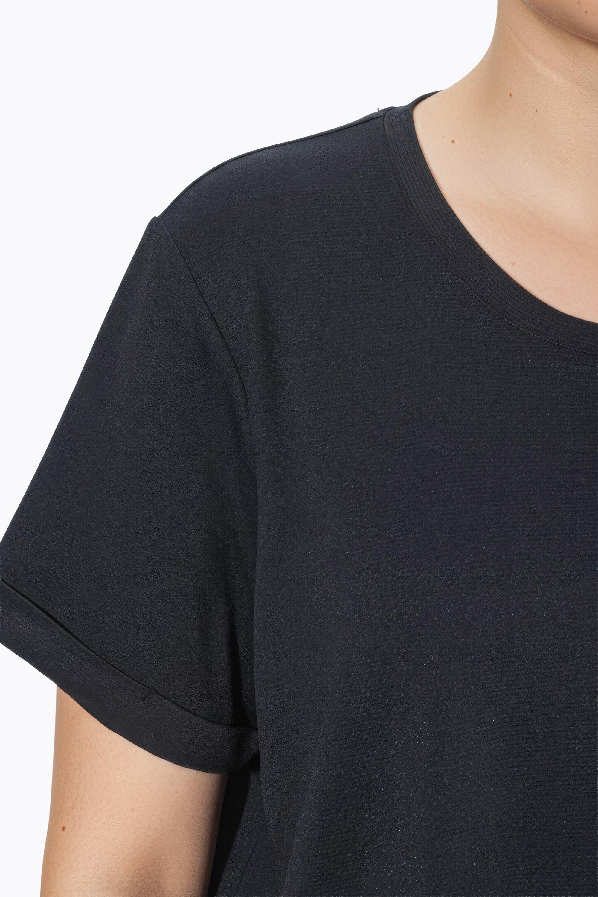 Femme T-shirt technique UV 50+. Col rond et manches courtes. Matière recyclée 4/7
