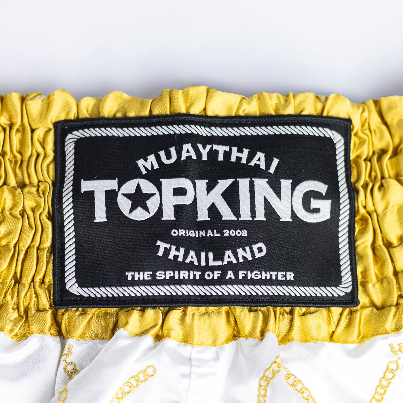 SHORT MUAY THAI TOPKING BLANC AVEC DÉTAILS DORÉS 2/4