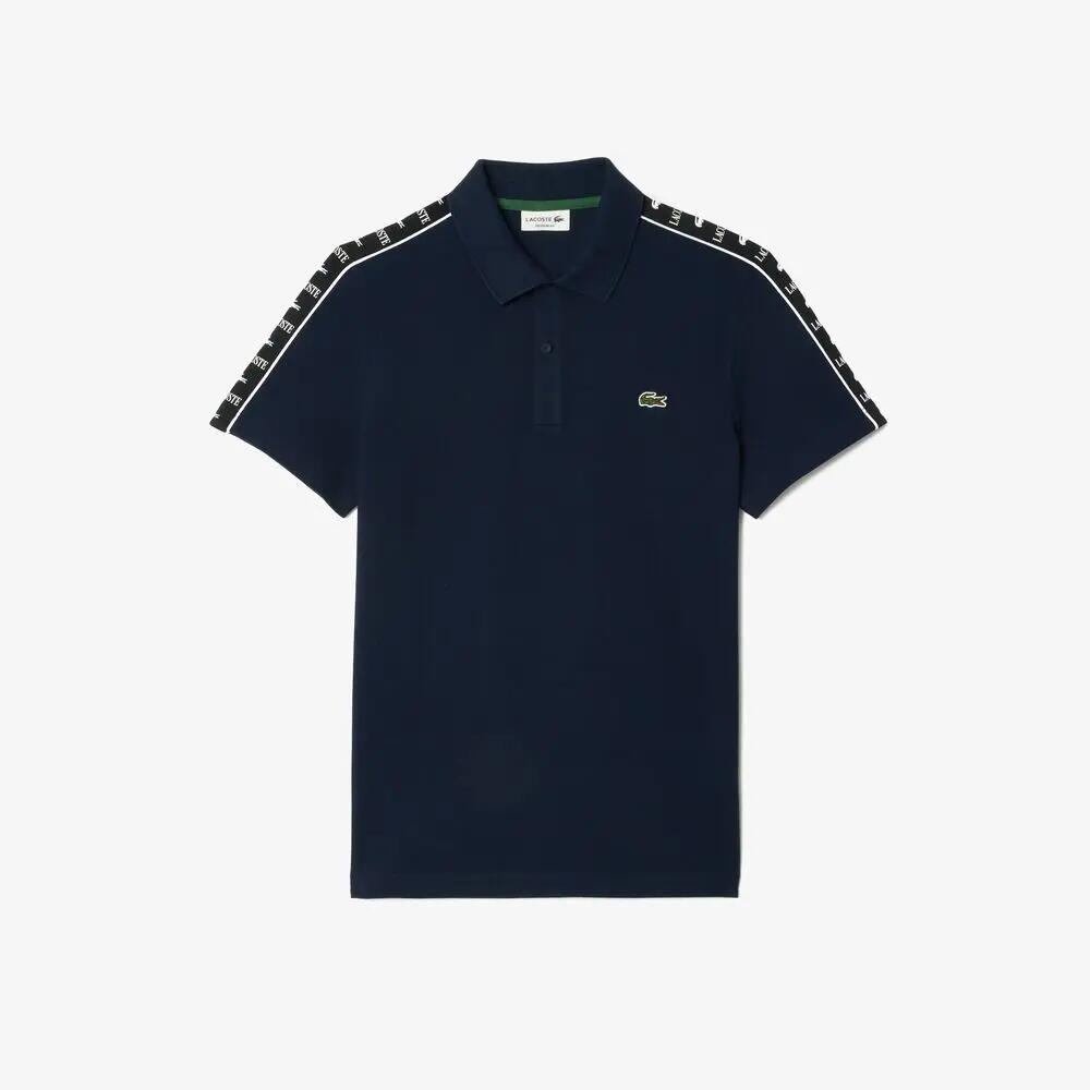 Polo Azul Marino Lacoste de Piqué Elástico con Raya y Logo 3/4