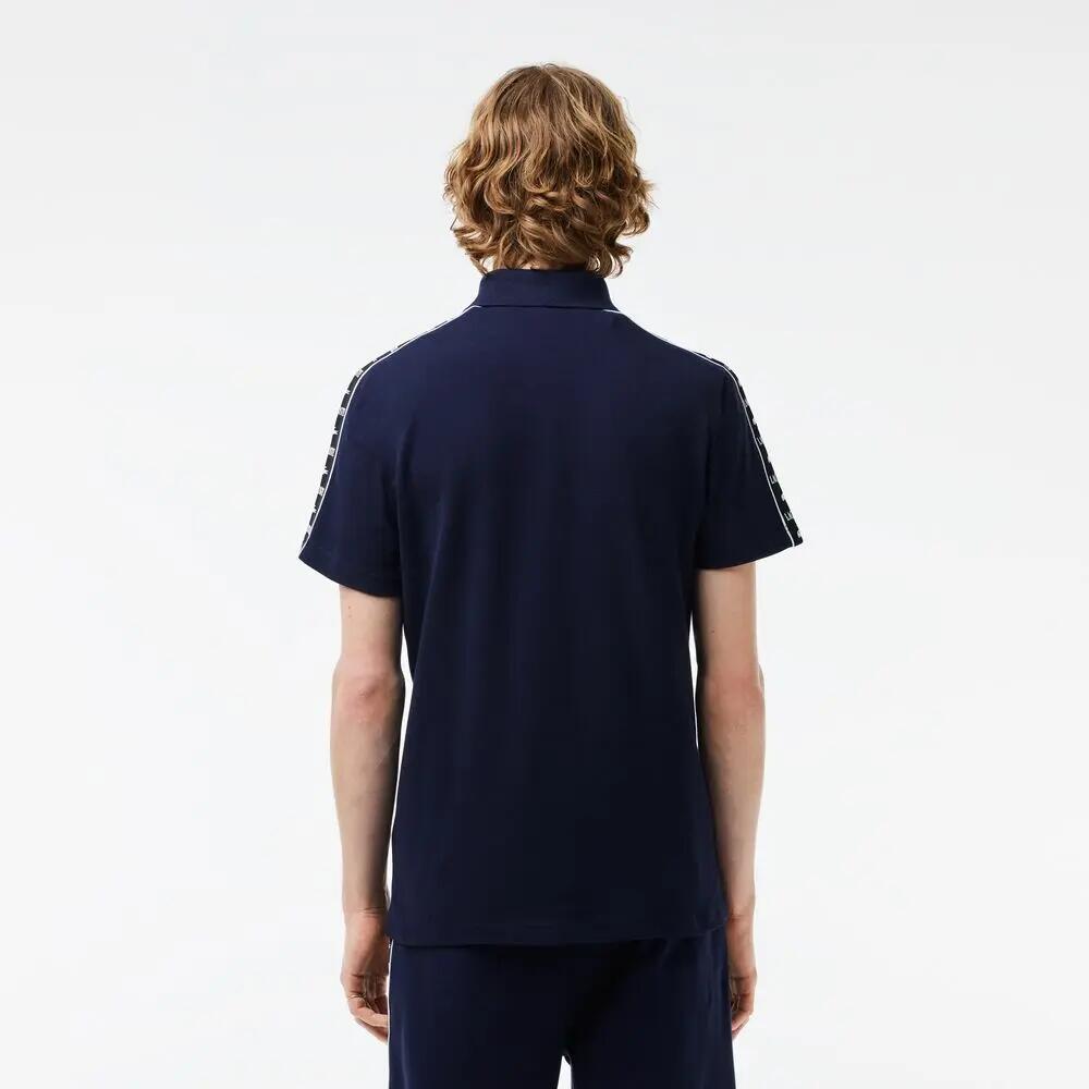 Polo Azul Marino Lacoste de Piqué Elástico con Raya y Logo 2/4