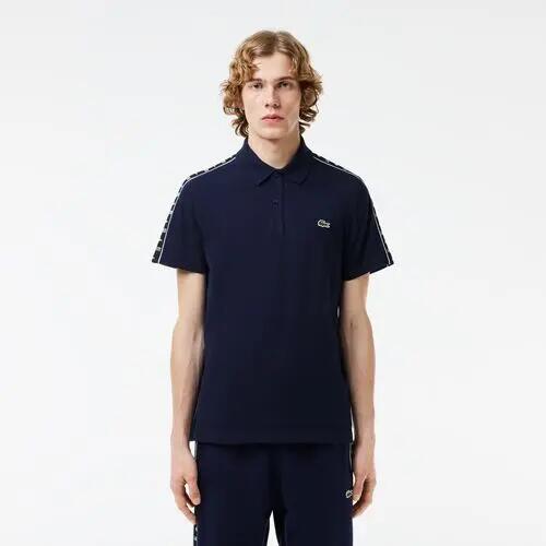 Polo Azul Marino Lacoste de Piqué Elástico con Raya y Logo 4/4