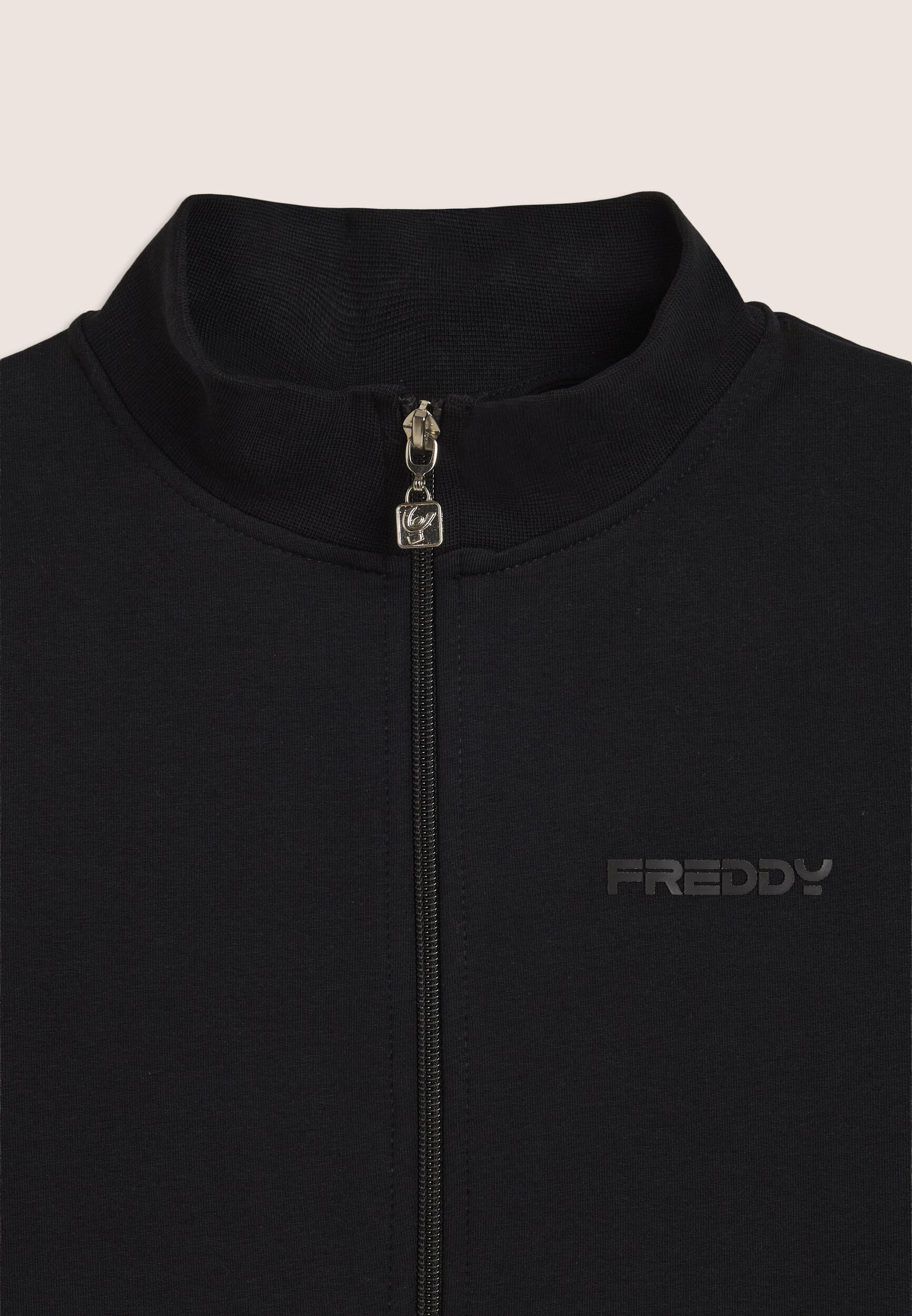Tuta Junior full-zip con collo alto e tasche a marsupio 3/3