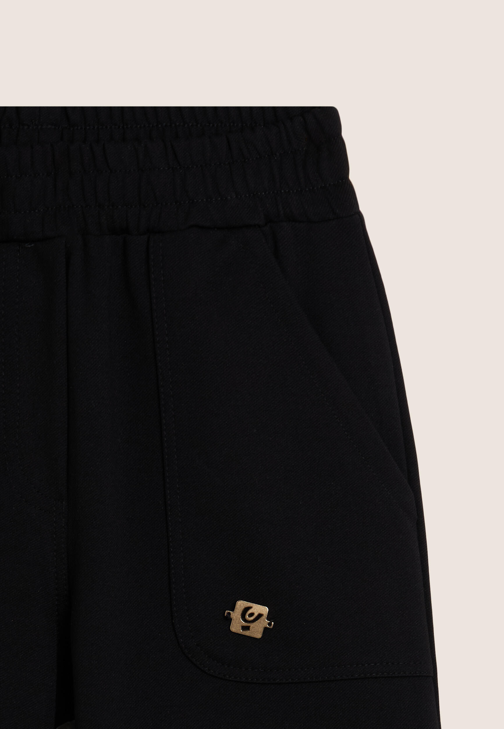 Pantalon Junior avec fermeture éclair dorée et bas élastique 3/3