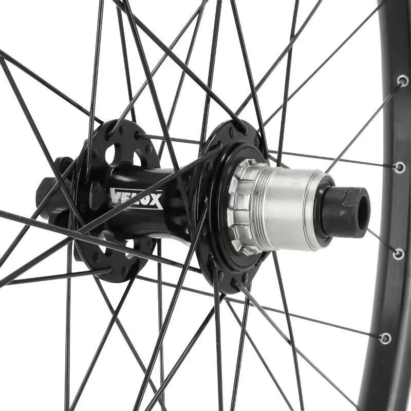 Roue arrière 6 trous moyeu axe traversant compatible VAE jante 32 rayons Velox T 4/4