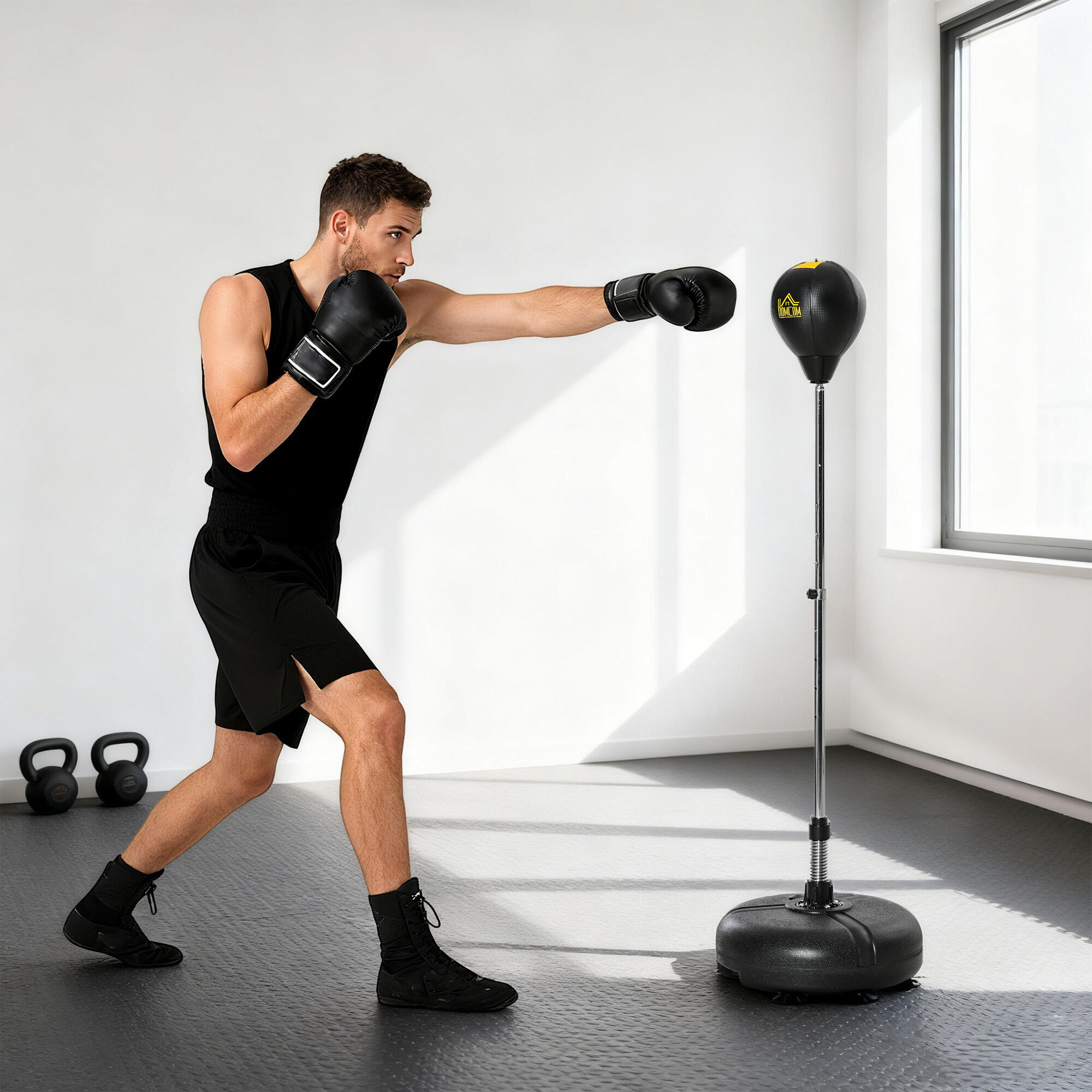 Saco de boxeo de pie ajustable con base rellenable 2/5