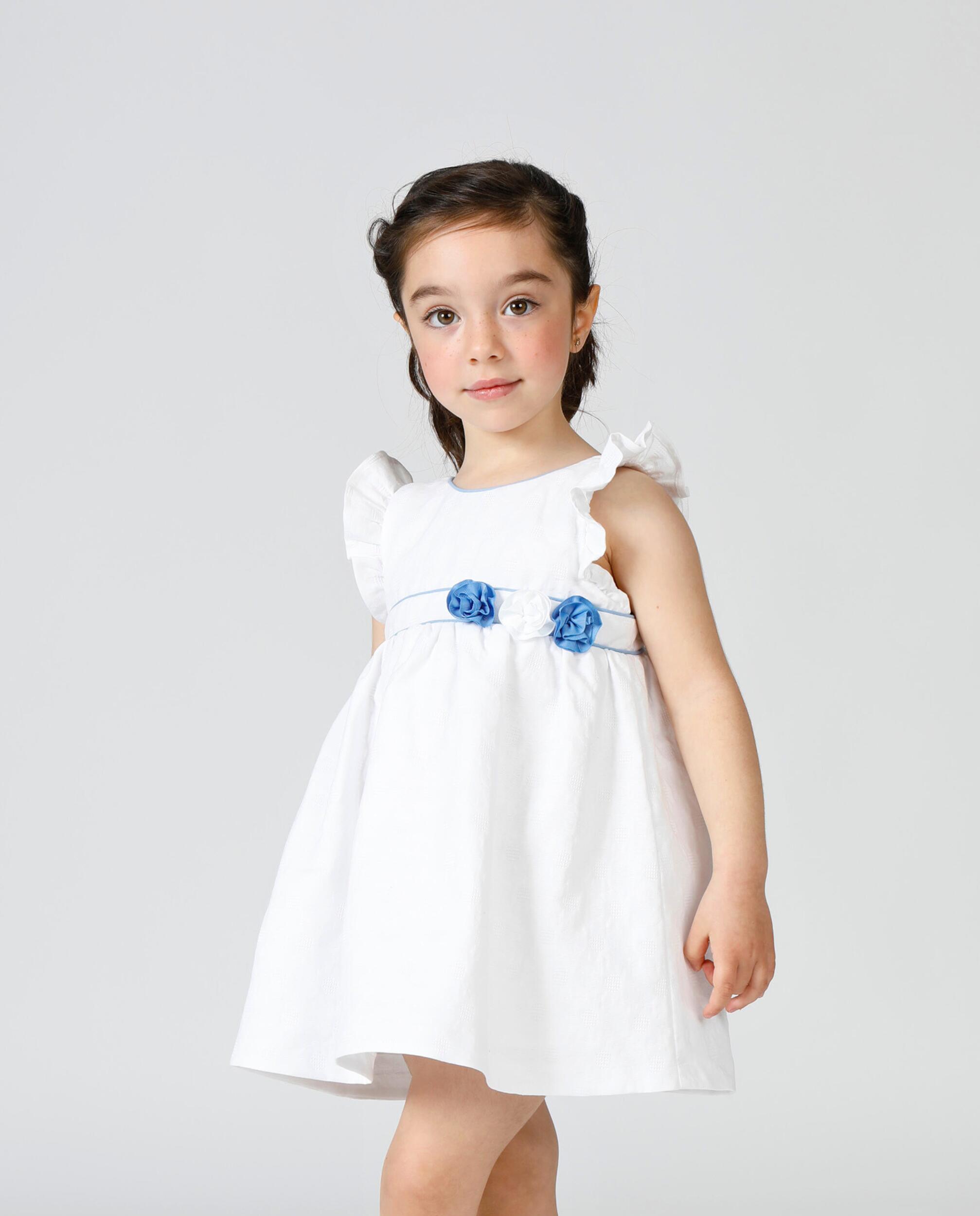Vestido de bebé blanco con flores azules 4/5