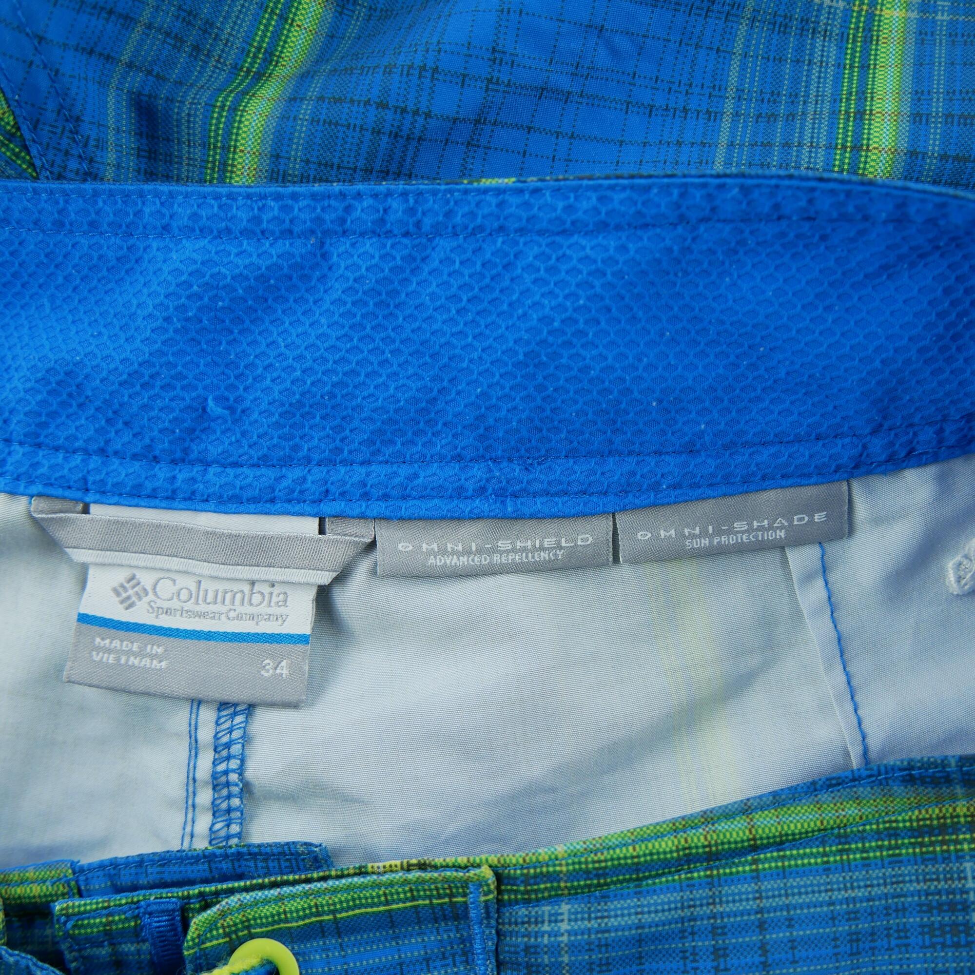Seconde vie - Short de bain Homme  Omni-Shield Bleu - Bon état 7/7