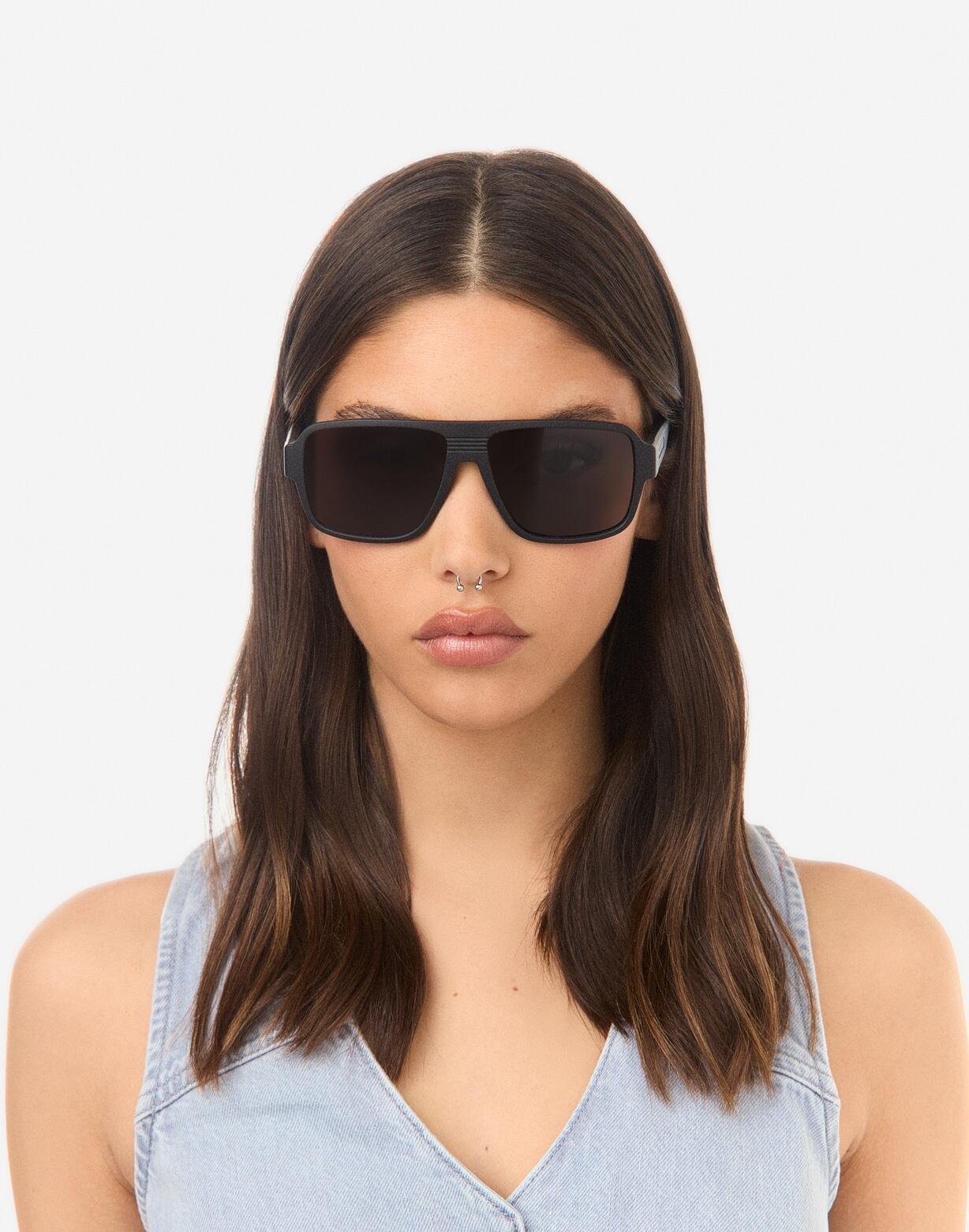 HAWKERS - Gafas de Sol para Hombre y Mujer BLACK GREY EXCLUSIVE - PARLAY 6/8