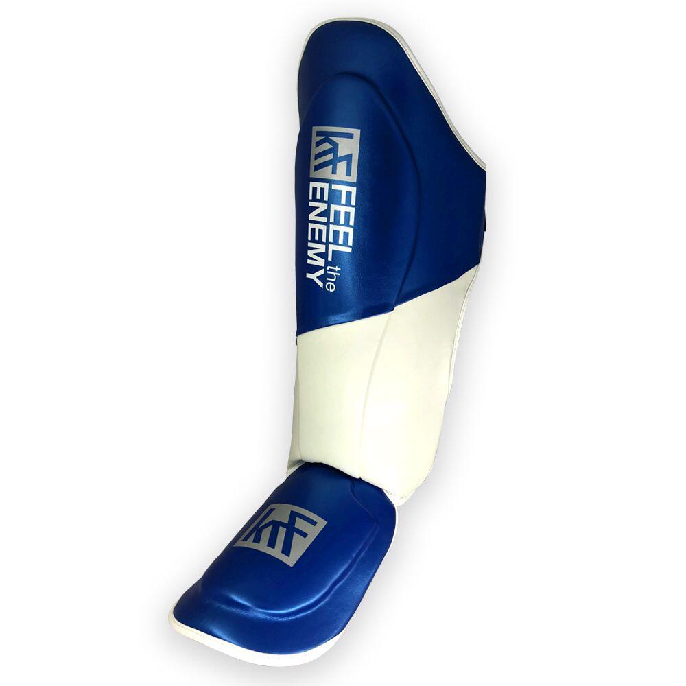 ESPINILLERA PROTECTORA CON PIE FEEL the ENEMY AZUL-BLANCO S 2/4
