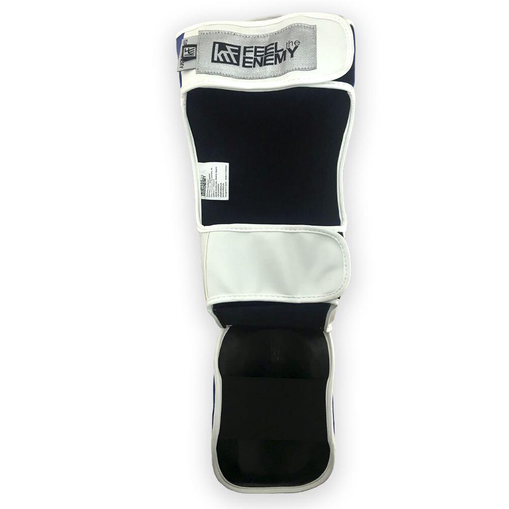 ESPINILLERA PROTECTORA CON PIE FEEL the ENEMY AZUL-BLANCO S 4/4