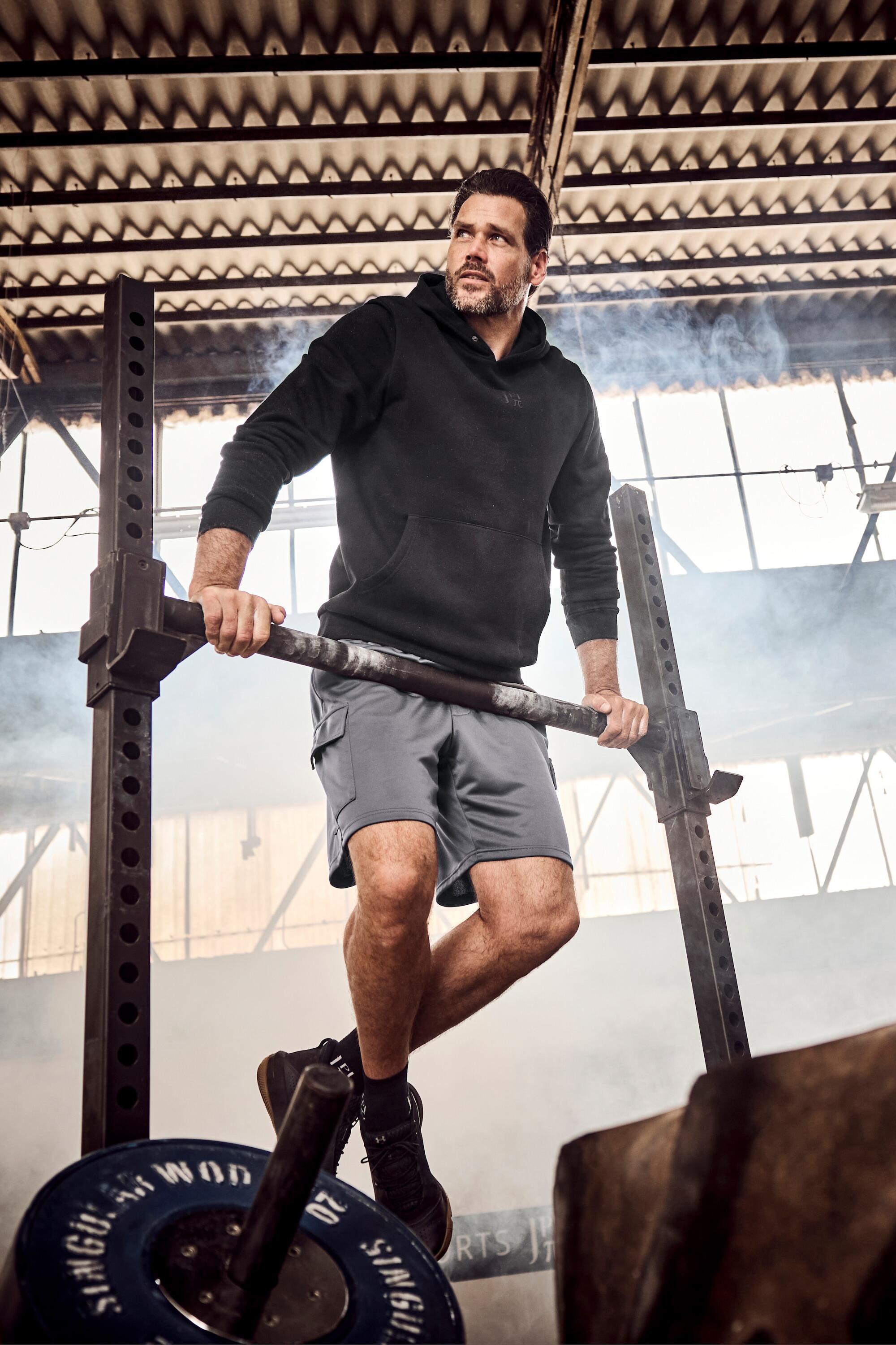 Hommes Sweat-shirt à capuche poche kangourou et imprimé dans le dos 6/6