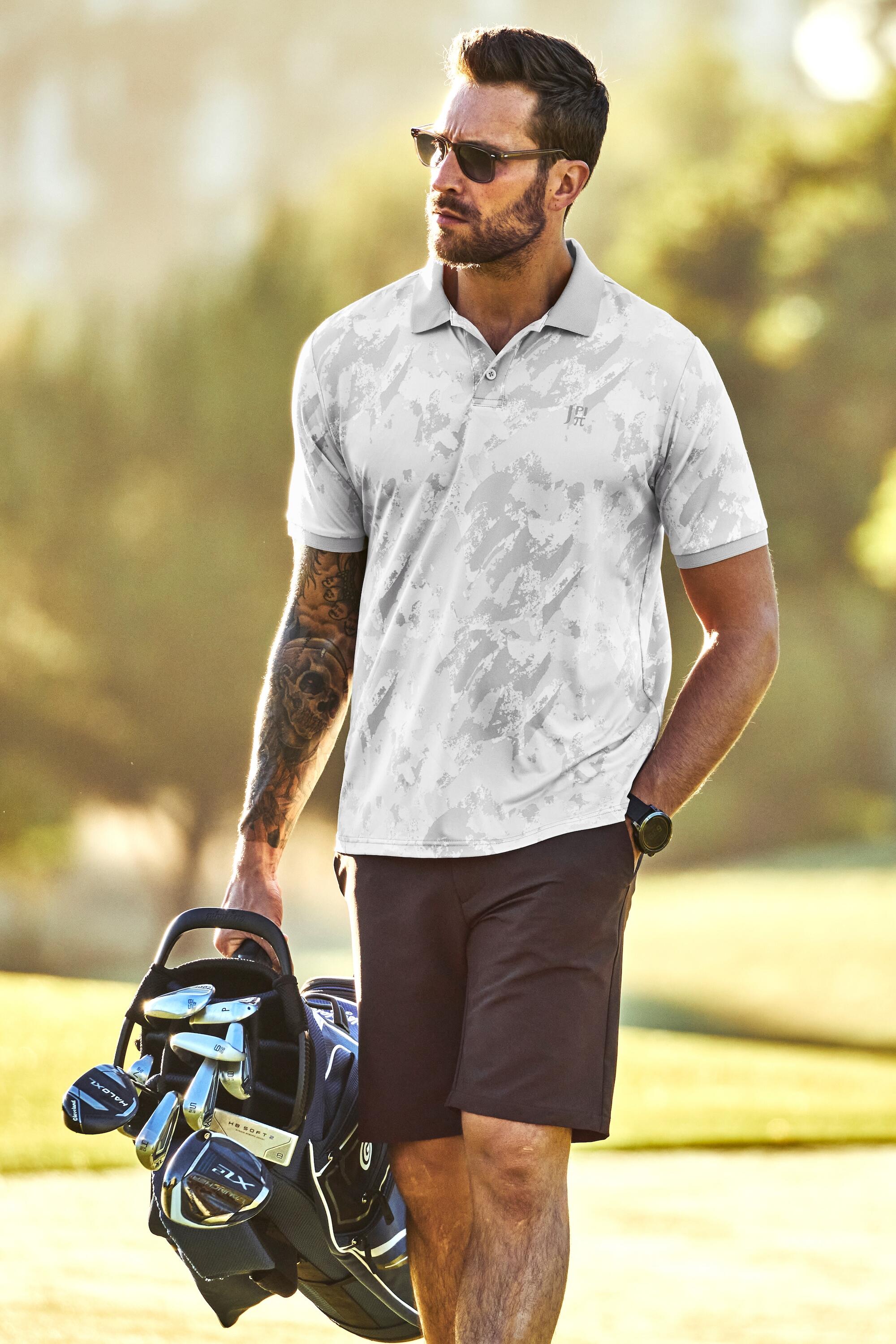 Hommes Polo à manches courtes technologies FLEXNAMIC® et QuickDry 6/6