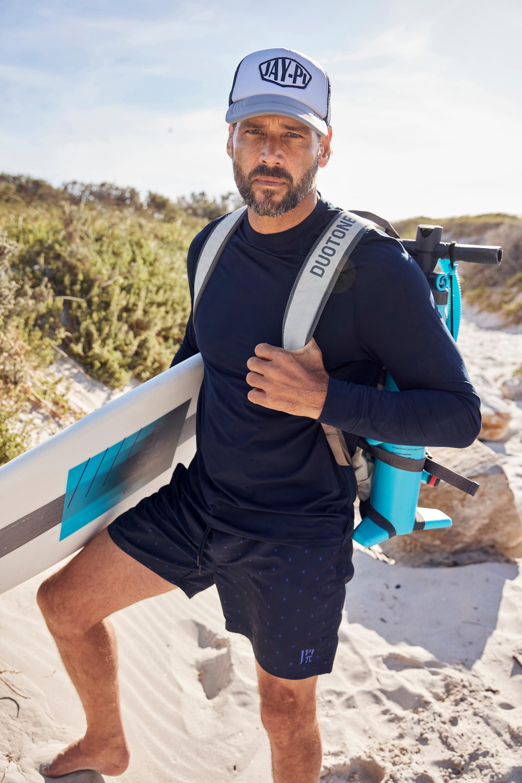 Hommes T-shirt de surf. Manches longues et col rond. Protection UV 5/5