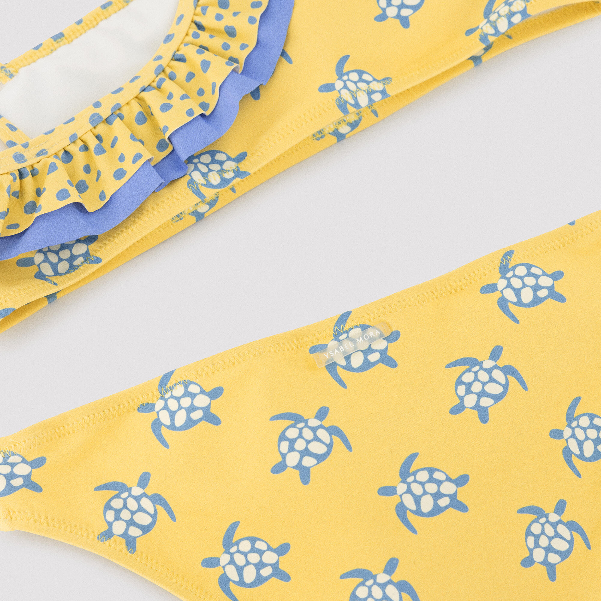 Bikini niña asimétrico detalle volantes estampado tortugas amarillo 3/7