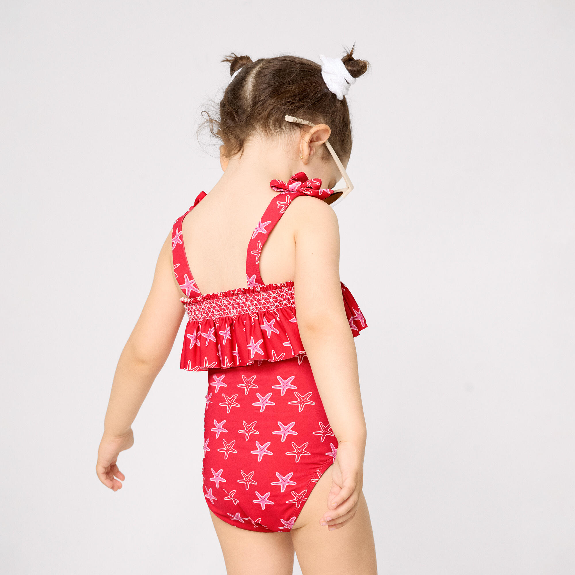 Bañador niña detalle volante estampado estrellas marinas rojo 2/2