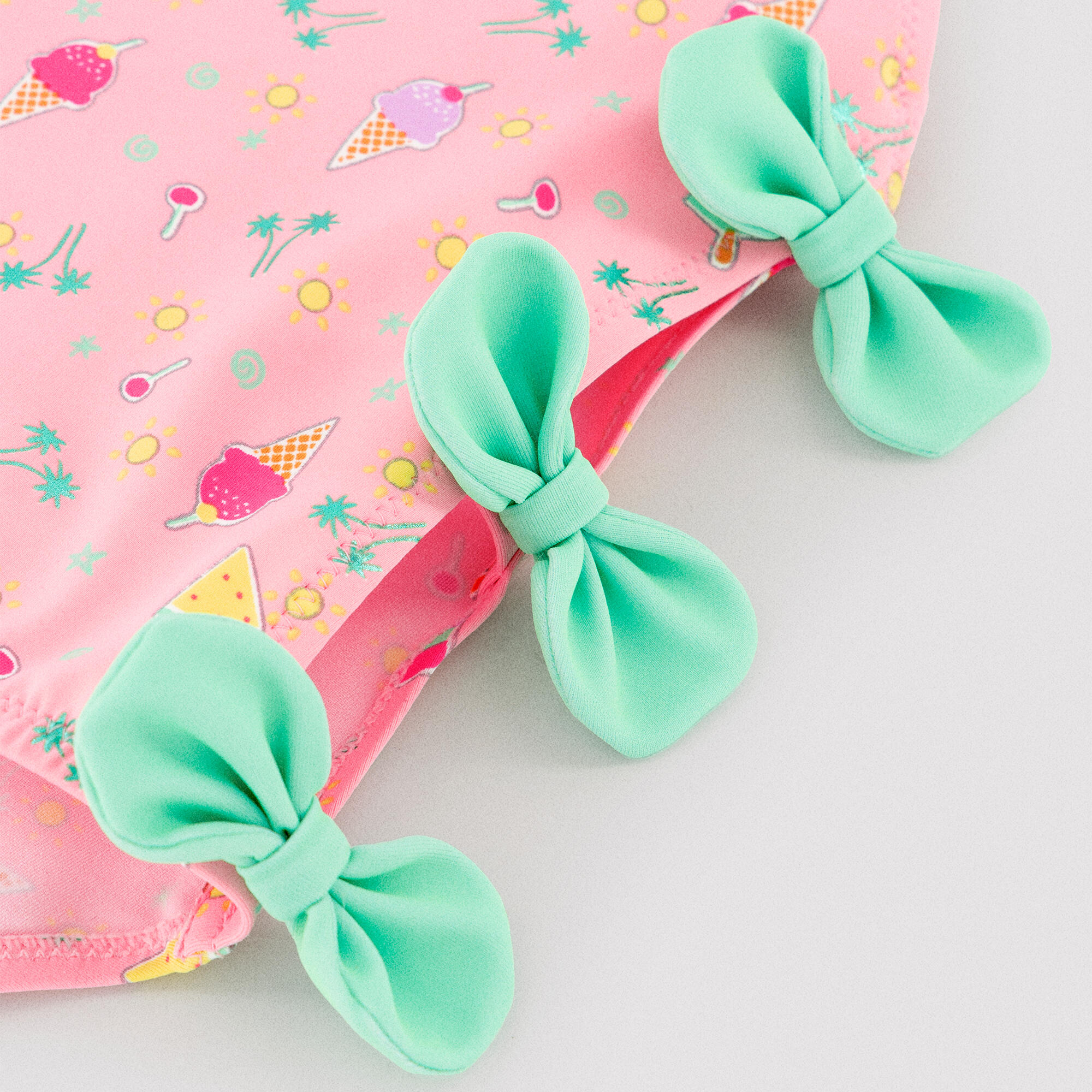 Bañador niña detalle cut-out y lazos estampado veraniego rosa 2/7