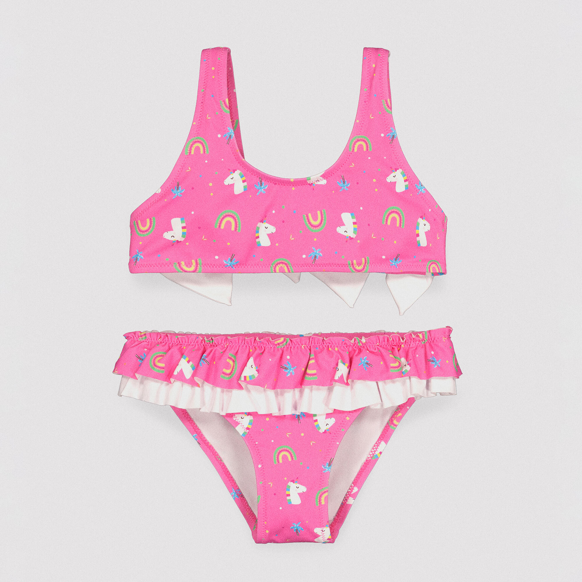 Bikini niña detalle volantes y lazos estampado unicornios rosa 1/7