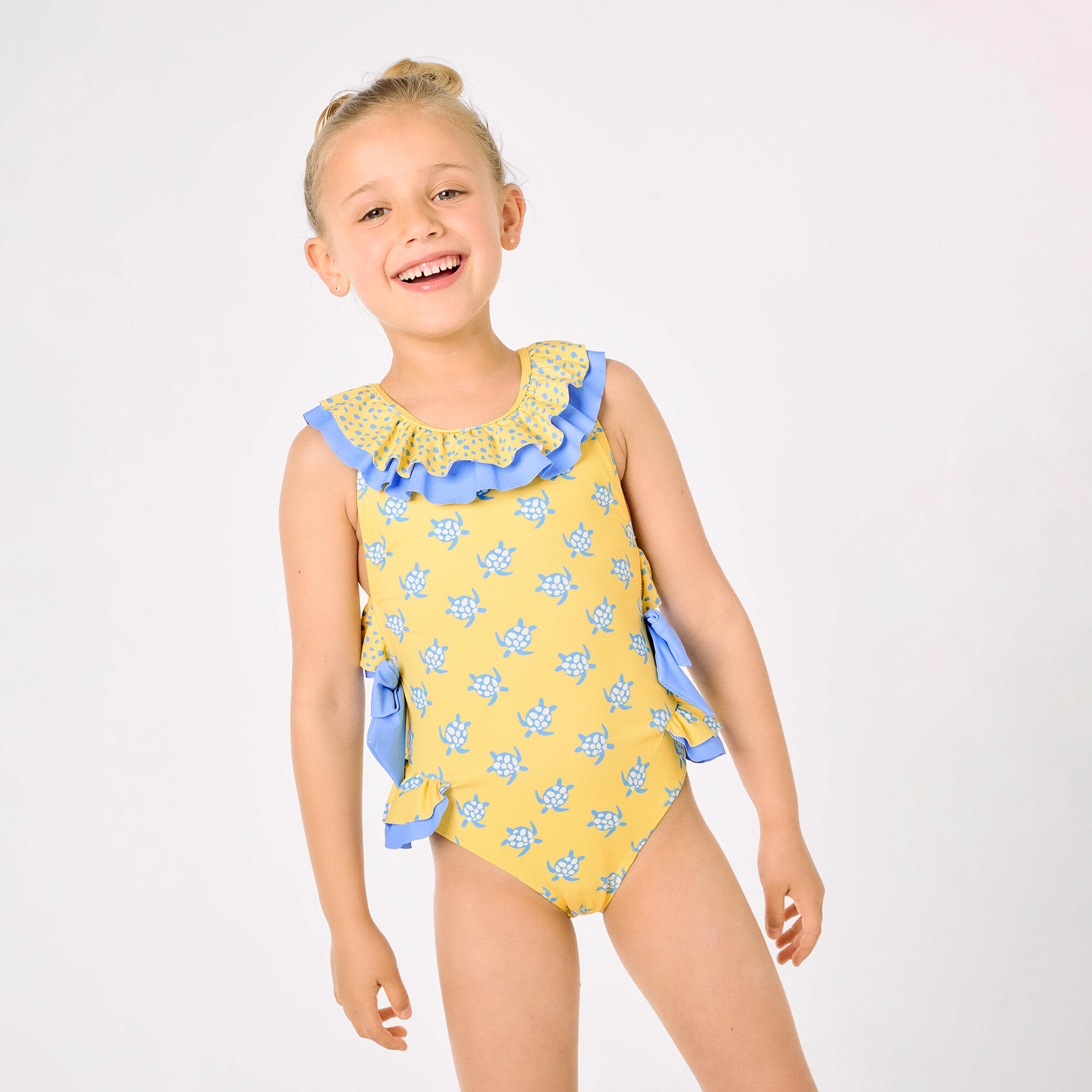 Bañador niña detalles volantes y lazos estampado tortugas amarillo 3/7