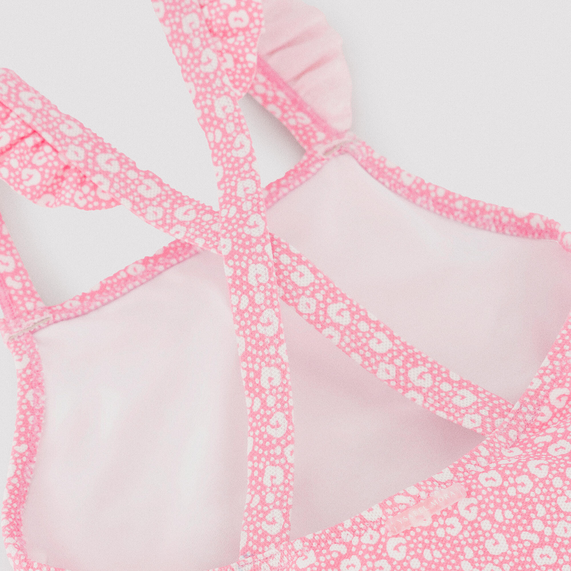 Bañador niña detalles volantes y tirantes cruzados estampado leopardo rosa 3/7