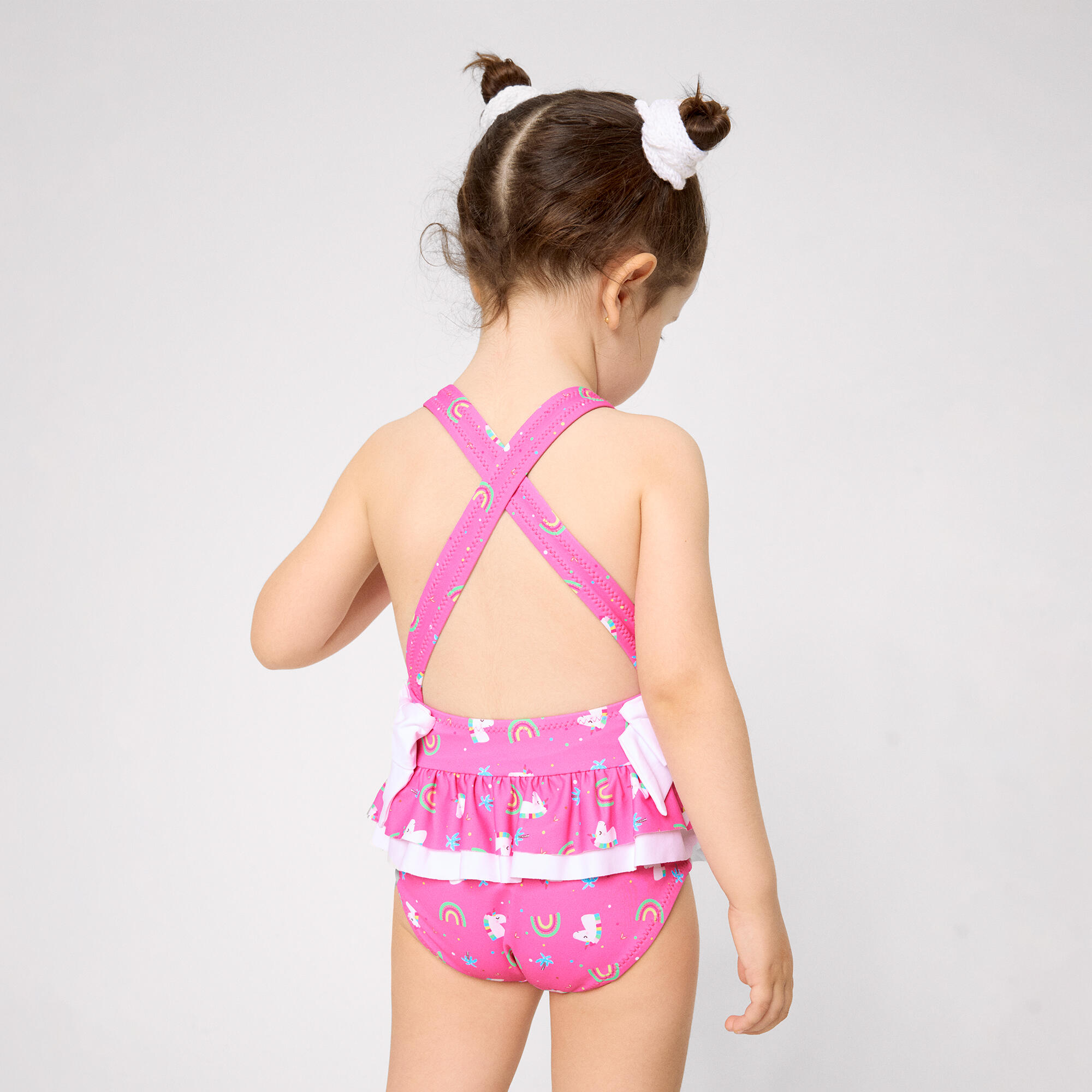 Bañador niña detalles volantes y lazos estampado unicornios rosa 5/5