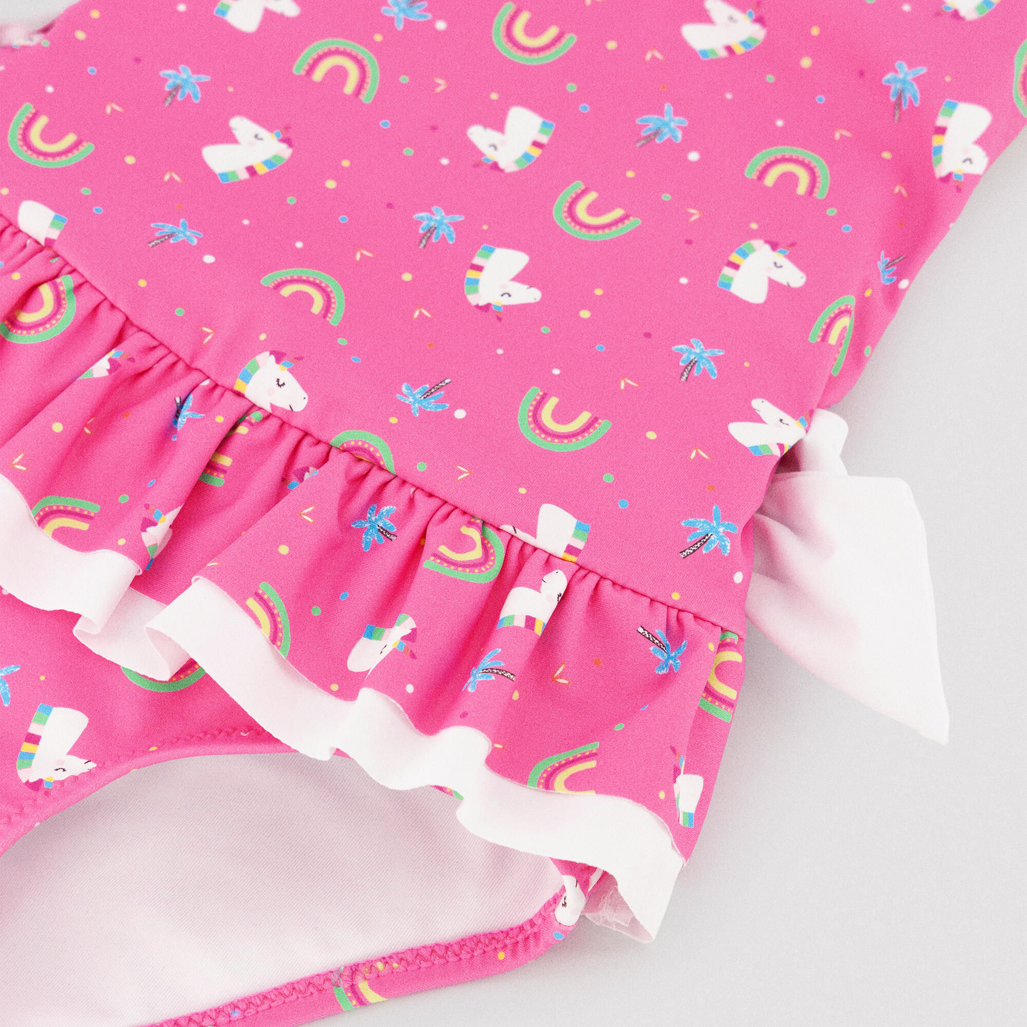 Bañador niña detalles volantes y lazos estampado unicornios rosa 2/5