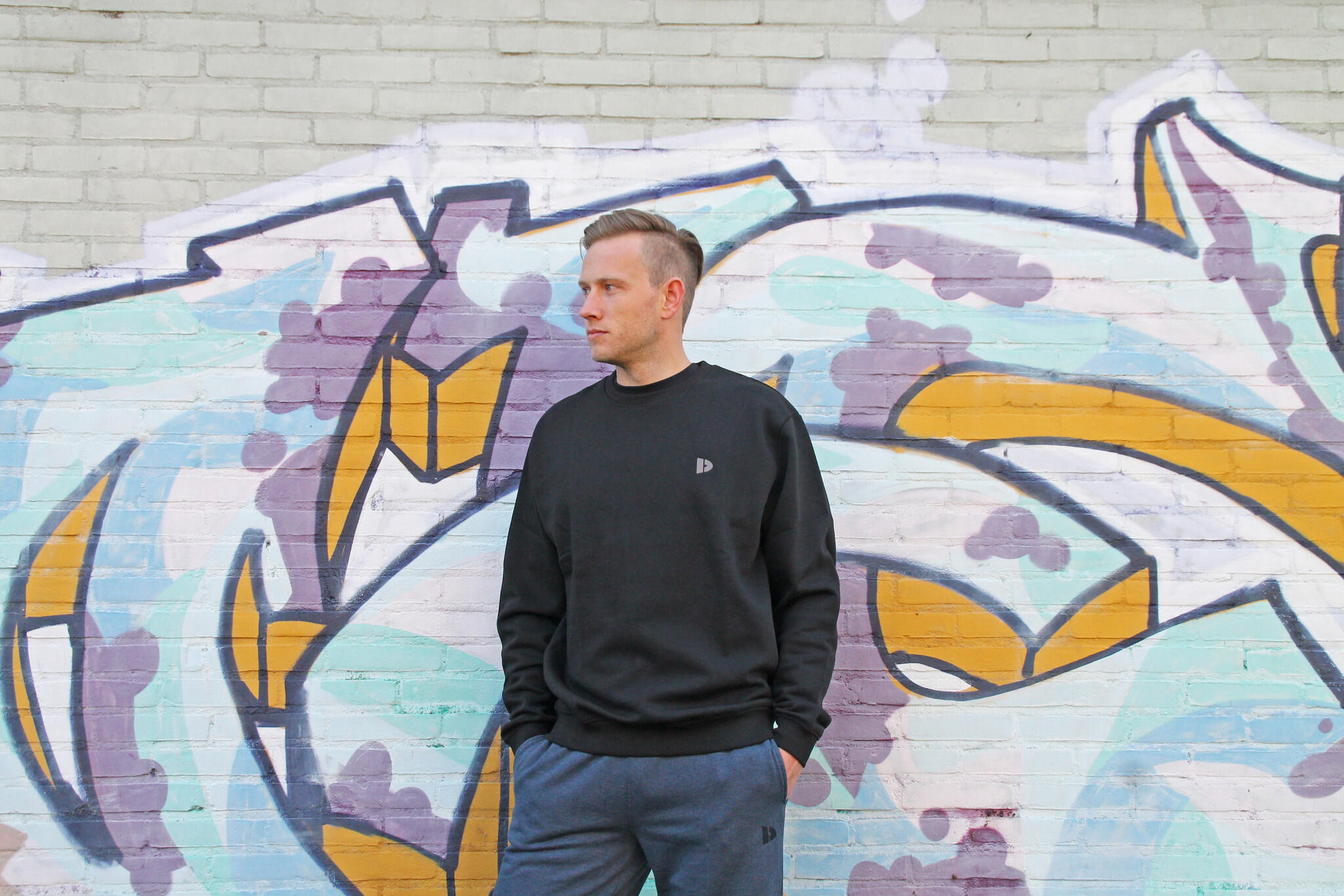 Der Donnay Multi-Sport-Pullover Dean mit Rundhalsausschnitt ist unisex. 4/5
