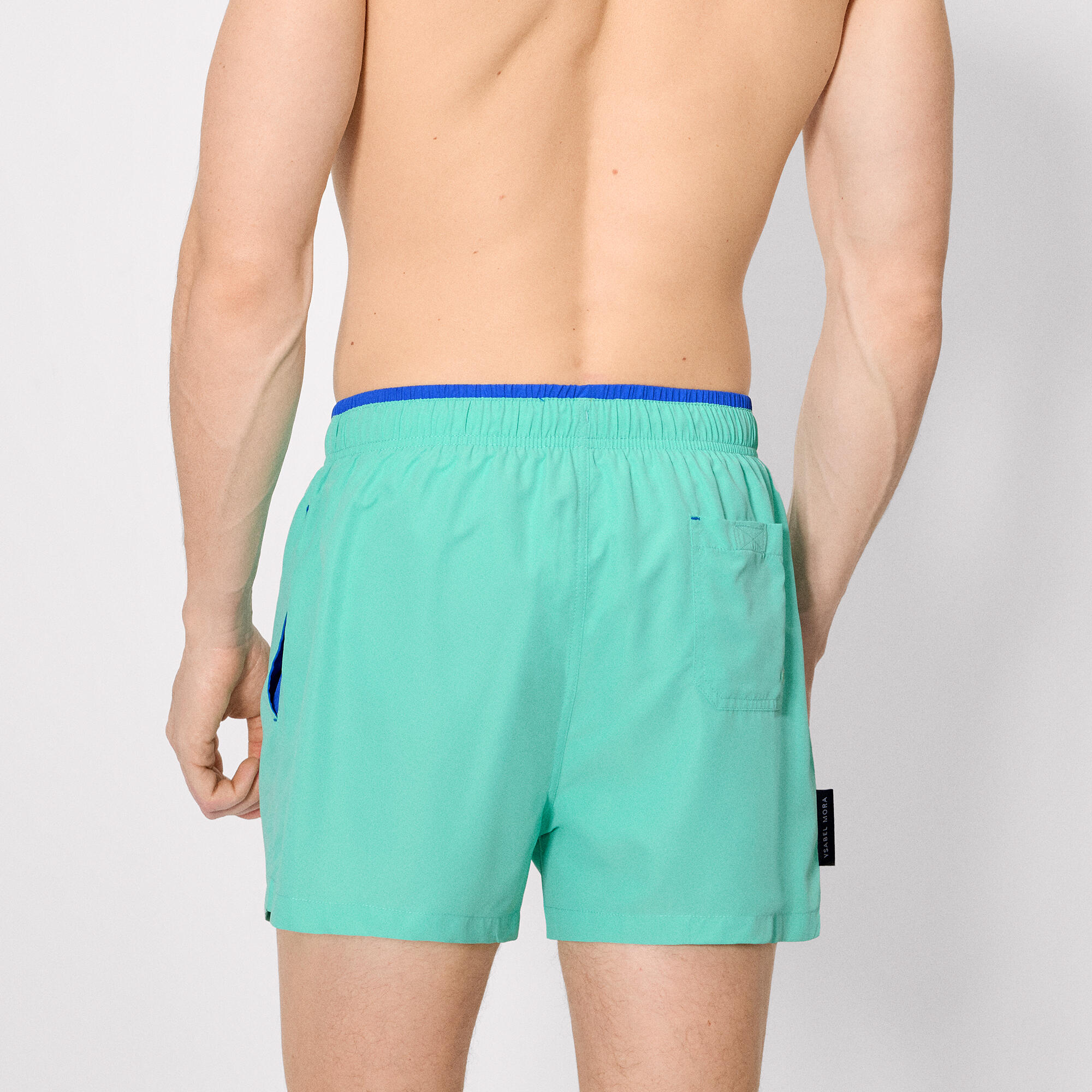 Maillot de bain court avec détail bleu à la taille 2/5