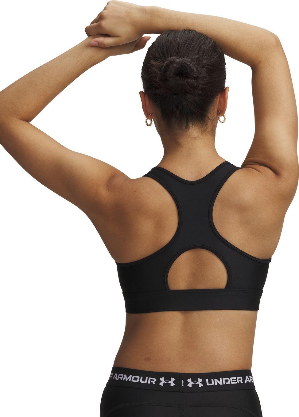 Top desportivo Under Armour HeatGear com suporte moderado, preto, para mulher 2/5