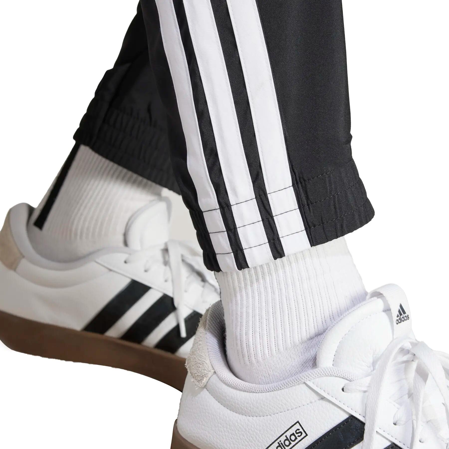 Tkane spodnie dresowe adidas Essentials 3-Stripes 6/6