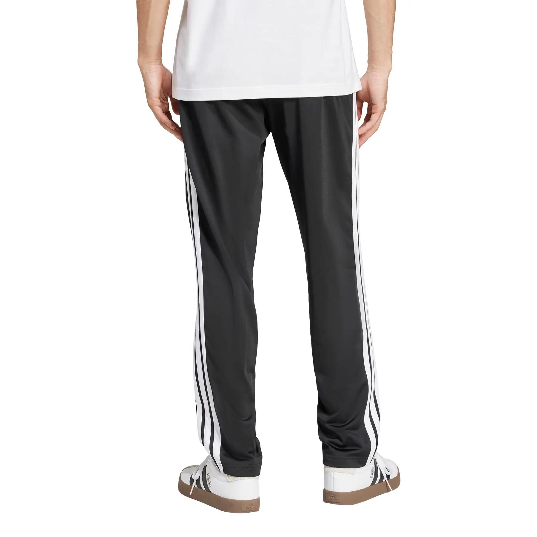 Calças de treino com a barra aberta adidas 3-Stripes 4/6