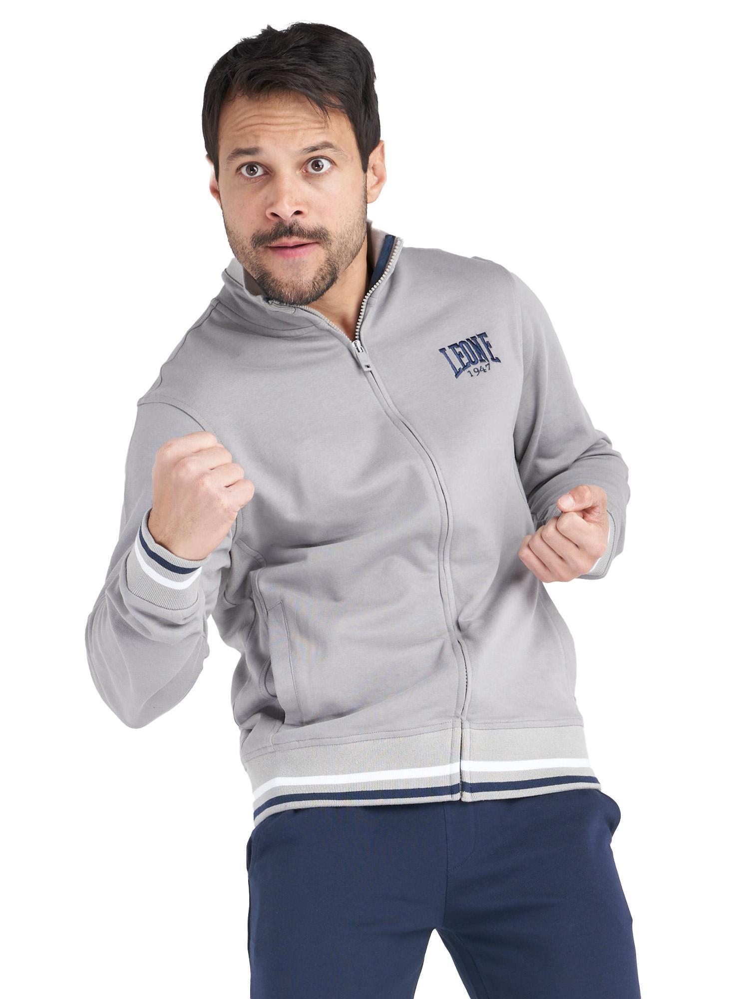 Chándal de algodón orgánico para hombre con cuello alto, línea minimalista. 1/4