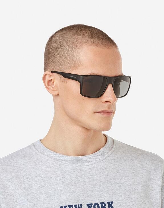 HAWKERS - Zonnebrillen voor mannen en vrouwen POLARIZED BLACK DARK - EDGE XL 7/8