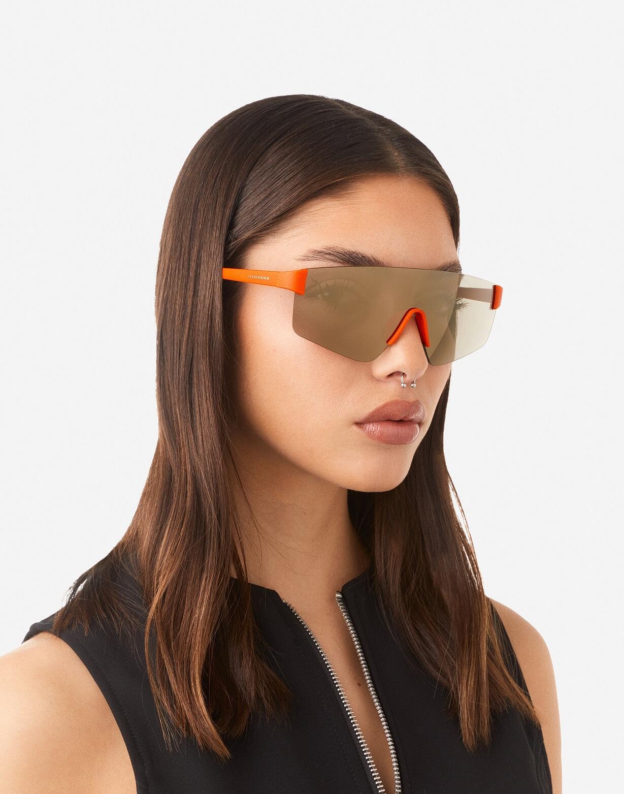 HAWKERS - Occhiali da sole per uomini e donne arancione beige - AERO 6/8