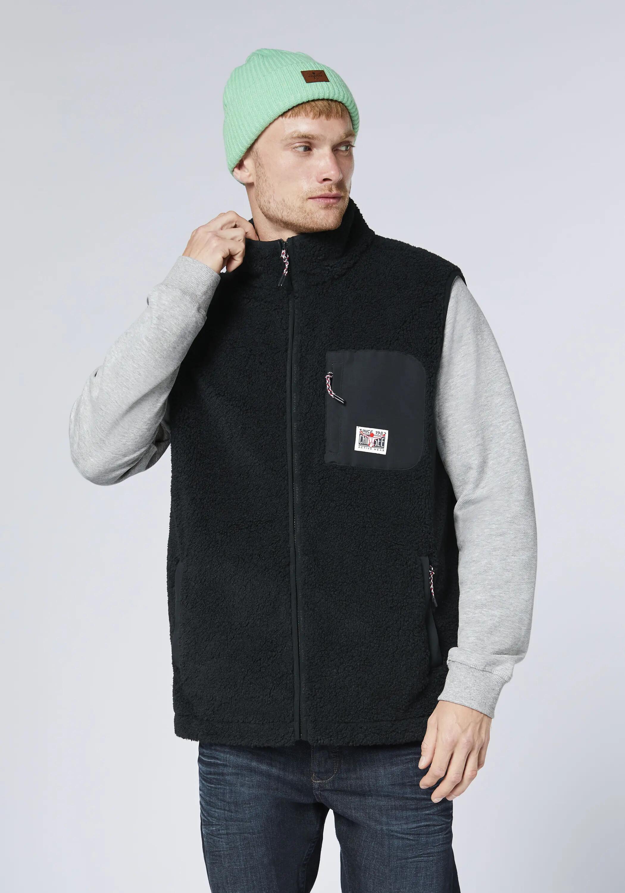 Weste aus warmen Sherpa-Fleece 3/7