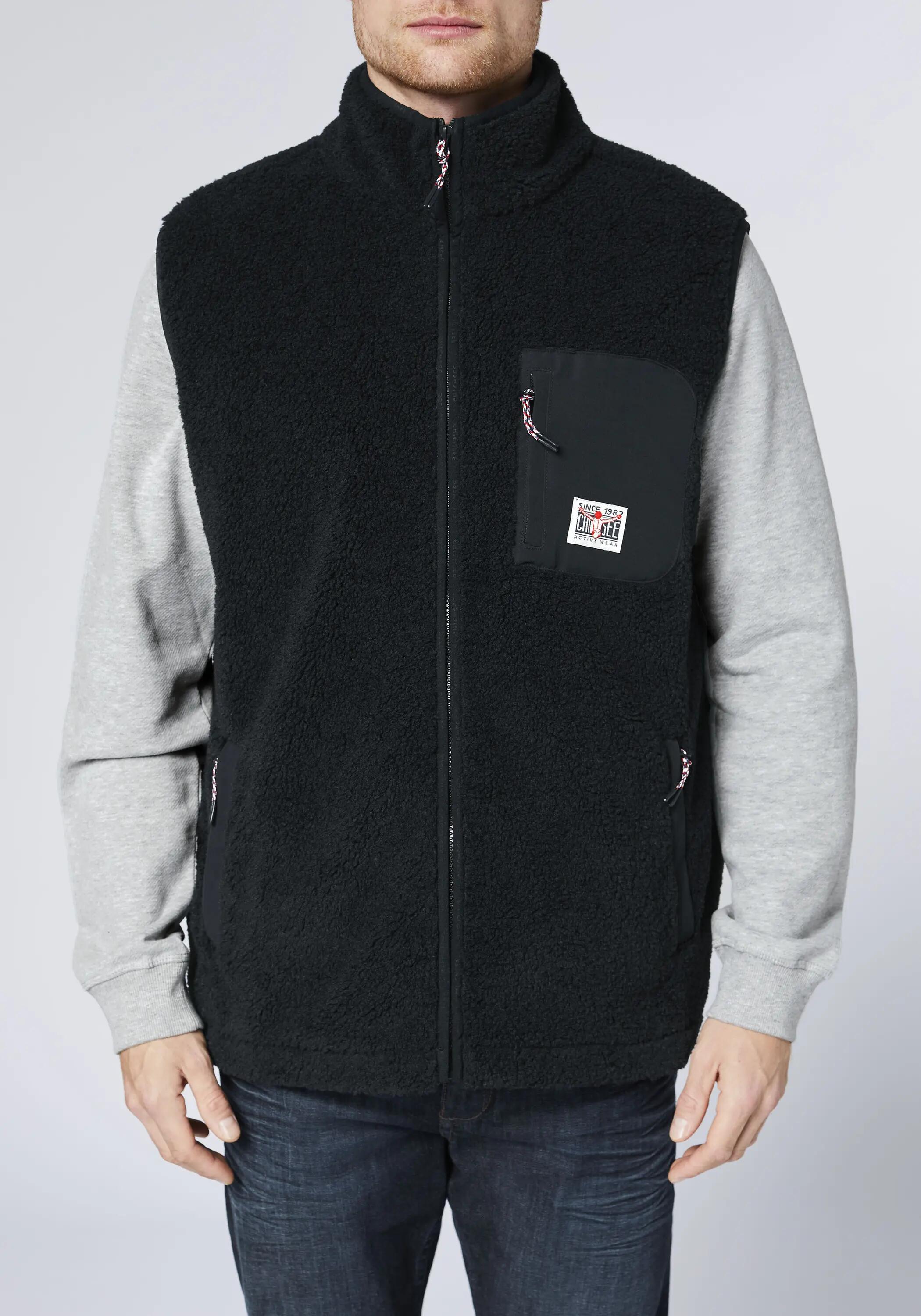 Weste aus warmen Sherpa-Fleece 7/7