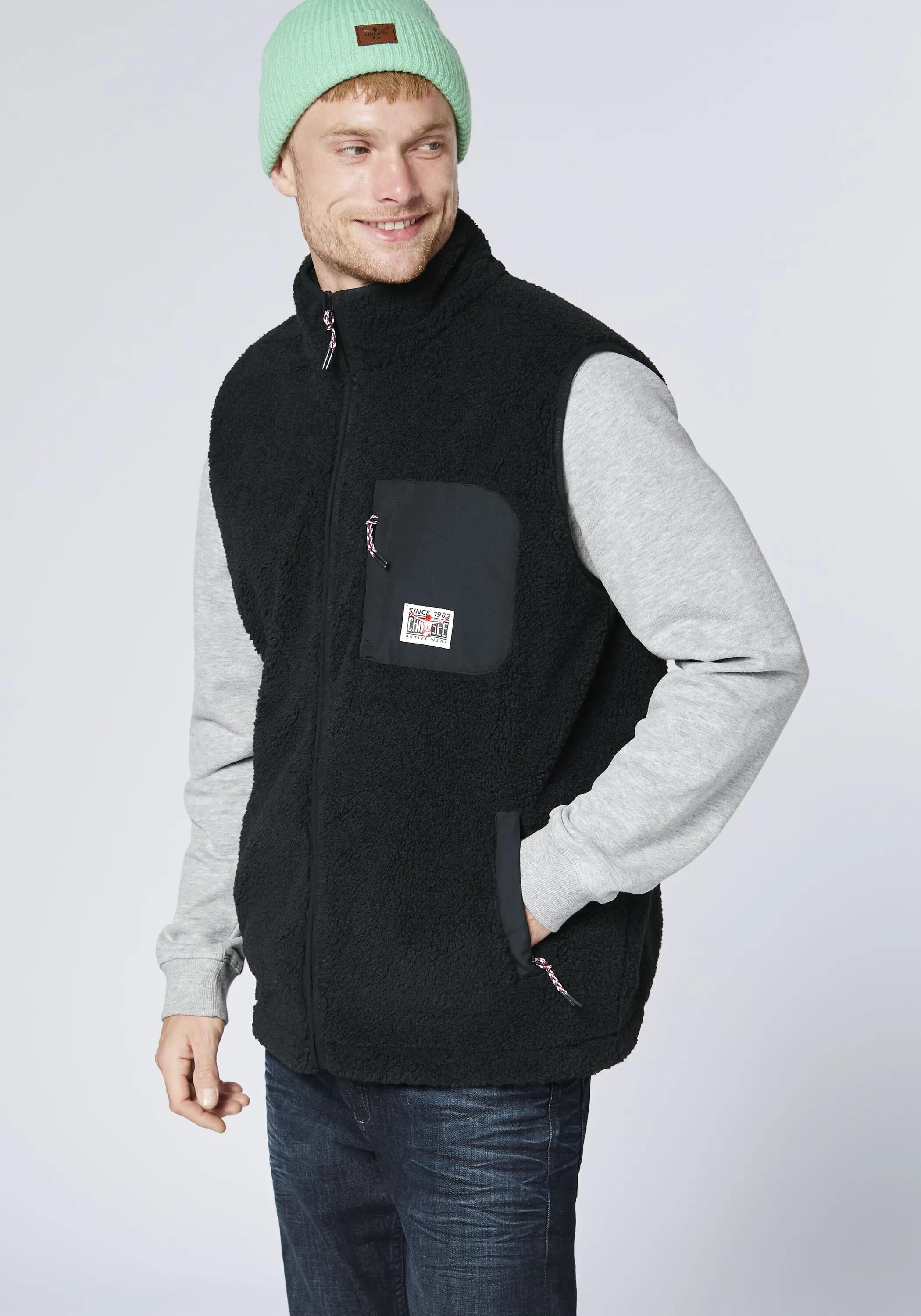 Weste aus warmen Sherpa-Fleece 6/7