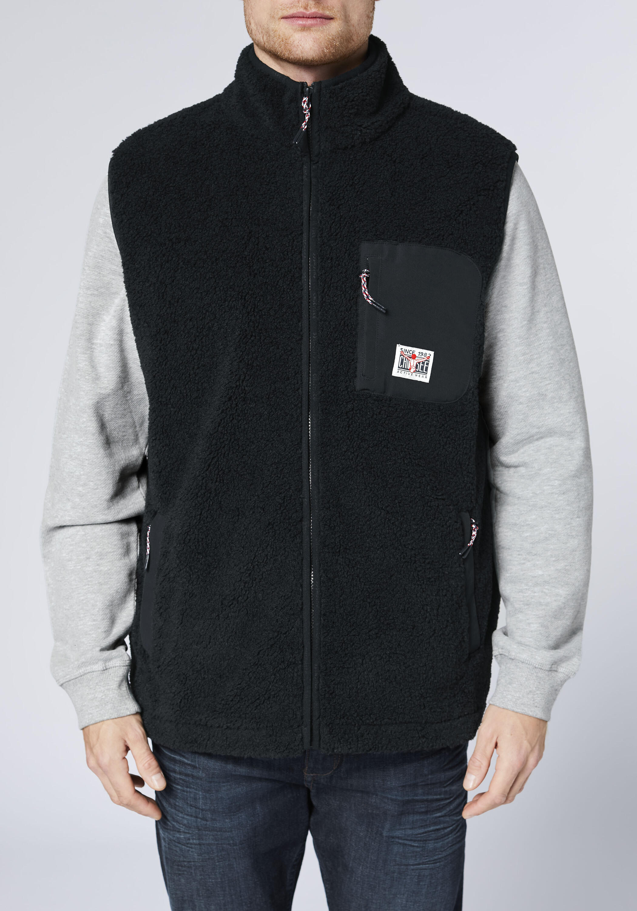 Weste aus warmen Sherpa-Fleece 7/7