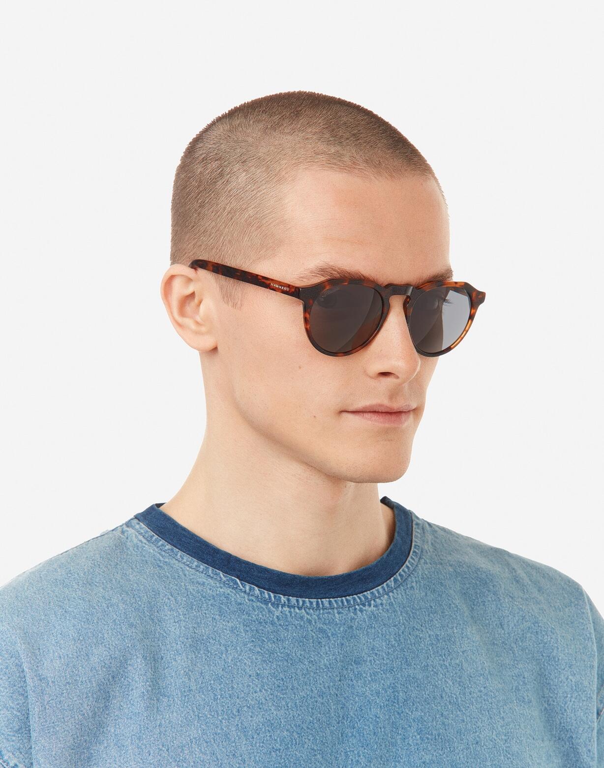 HAWKERS - Sonnenbrillen für Herren und Damen - WARWICK X  CAREY DARK 5/7
